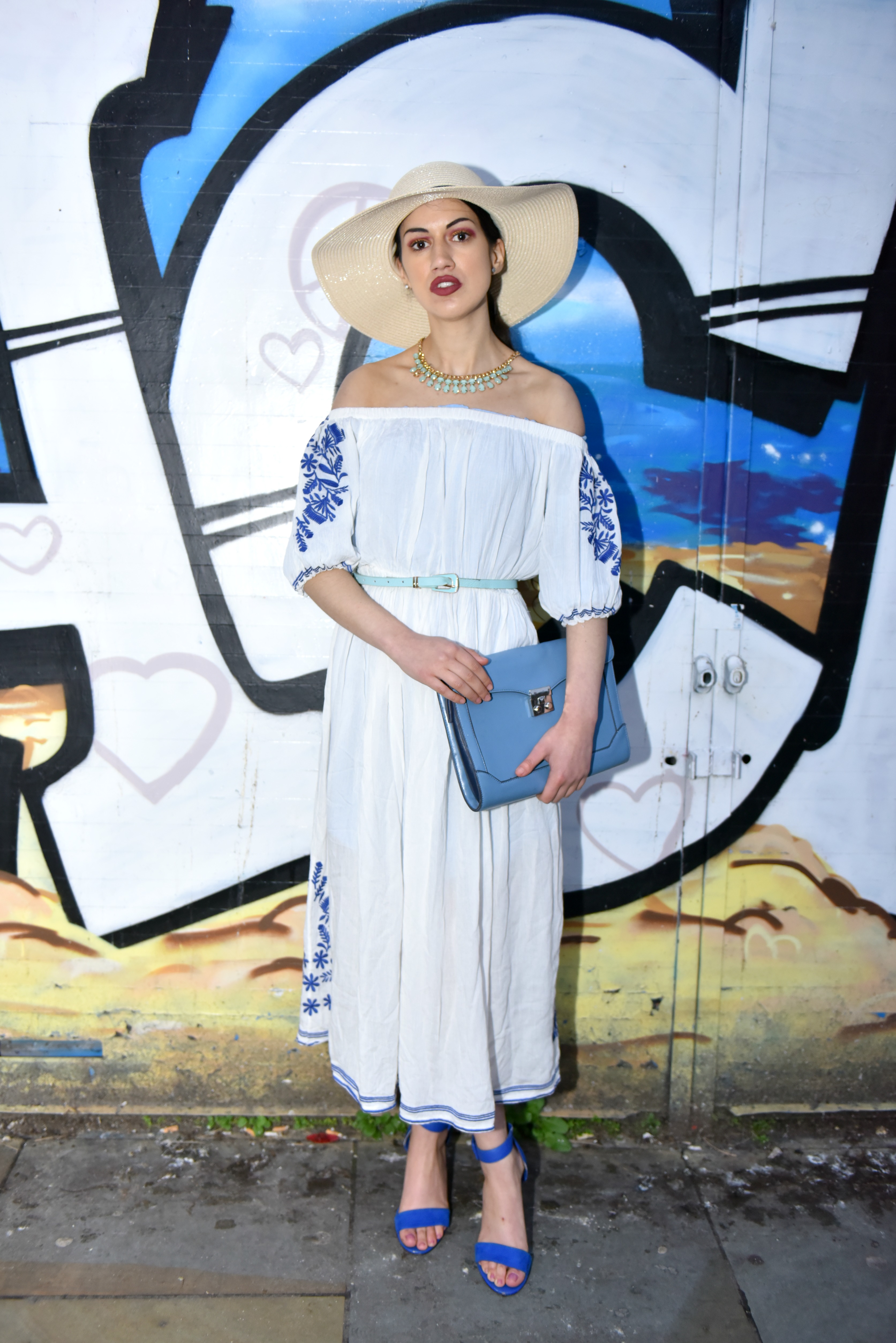 <img src="ana.jpg" alt="ana blue and white embroidered linen dress"> 
