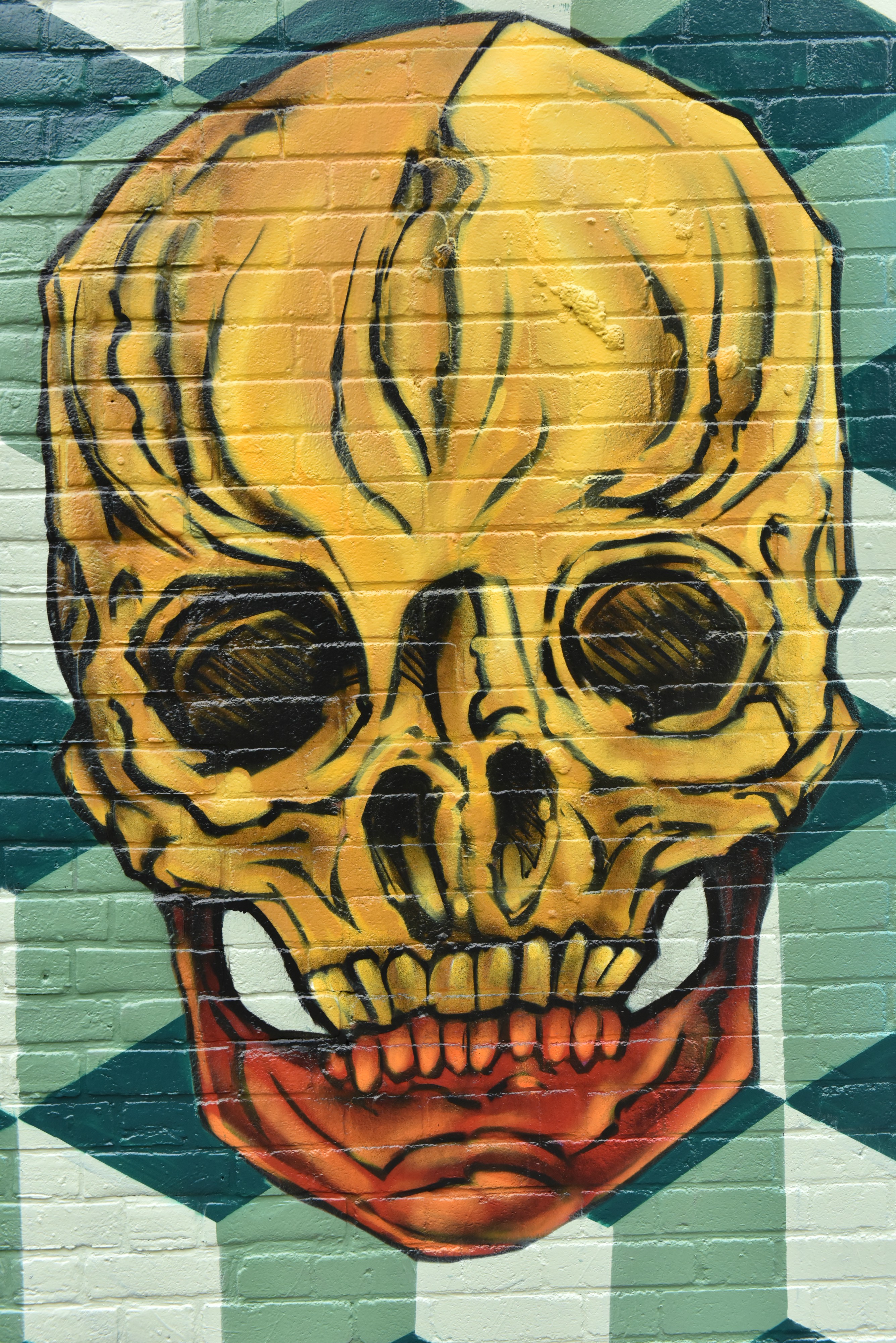 <img src="puppy.jpg" alt="ana yellow skull hanbury street art "> 