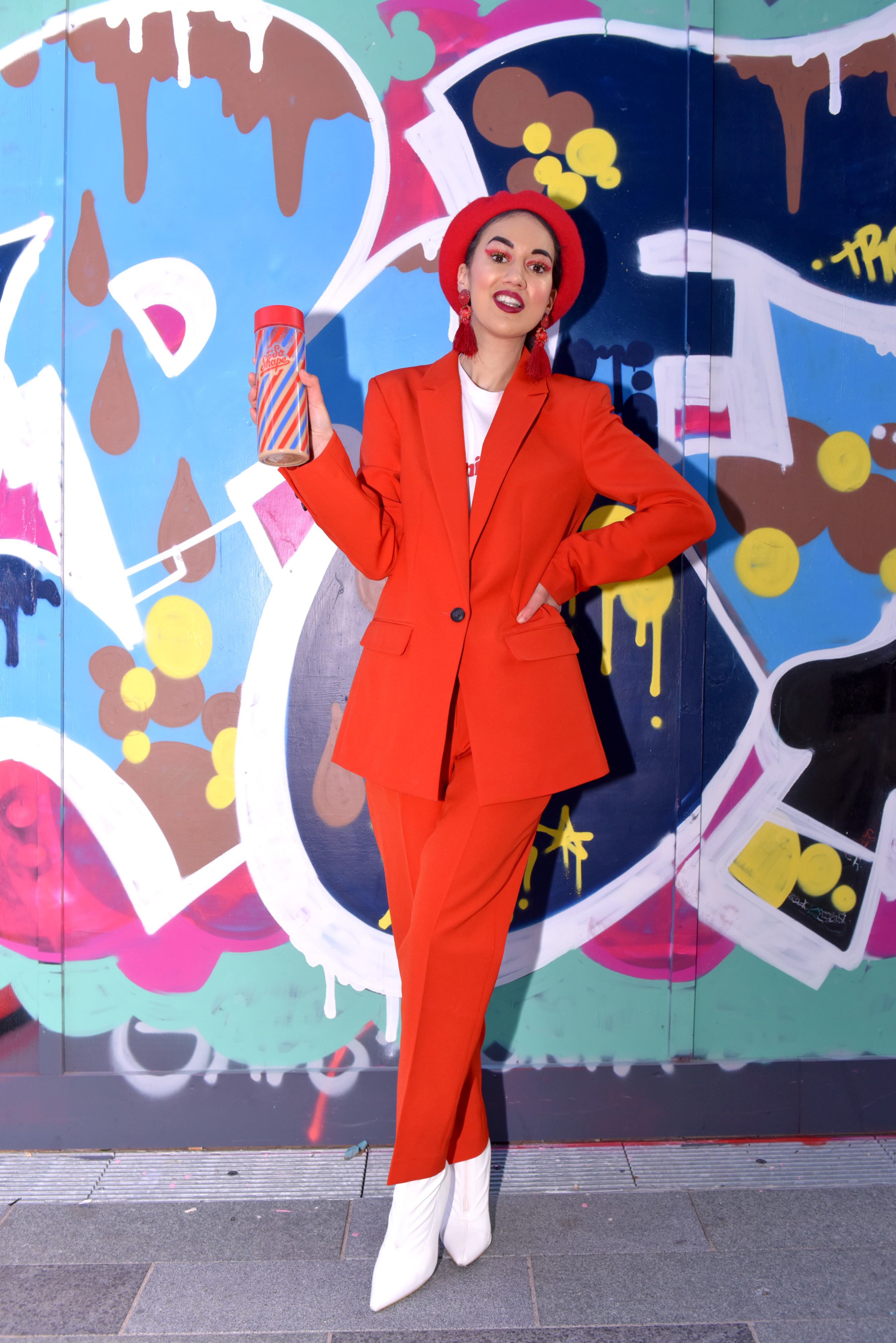 <img src="ana.jpg" alt="ana red trouser suit and so shape"/> 