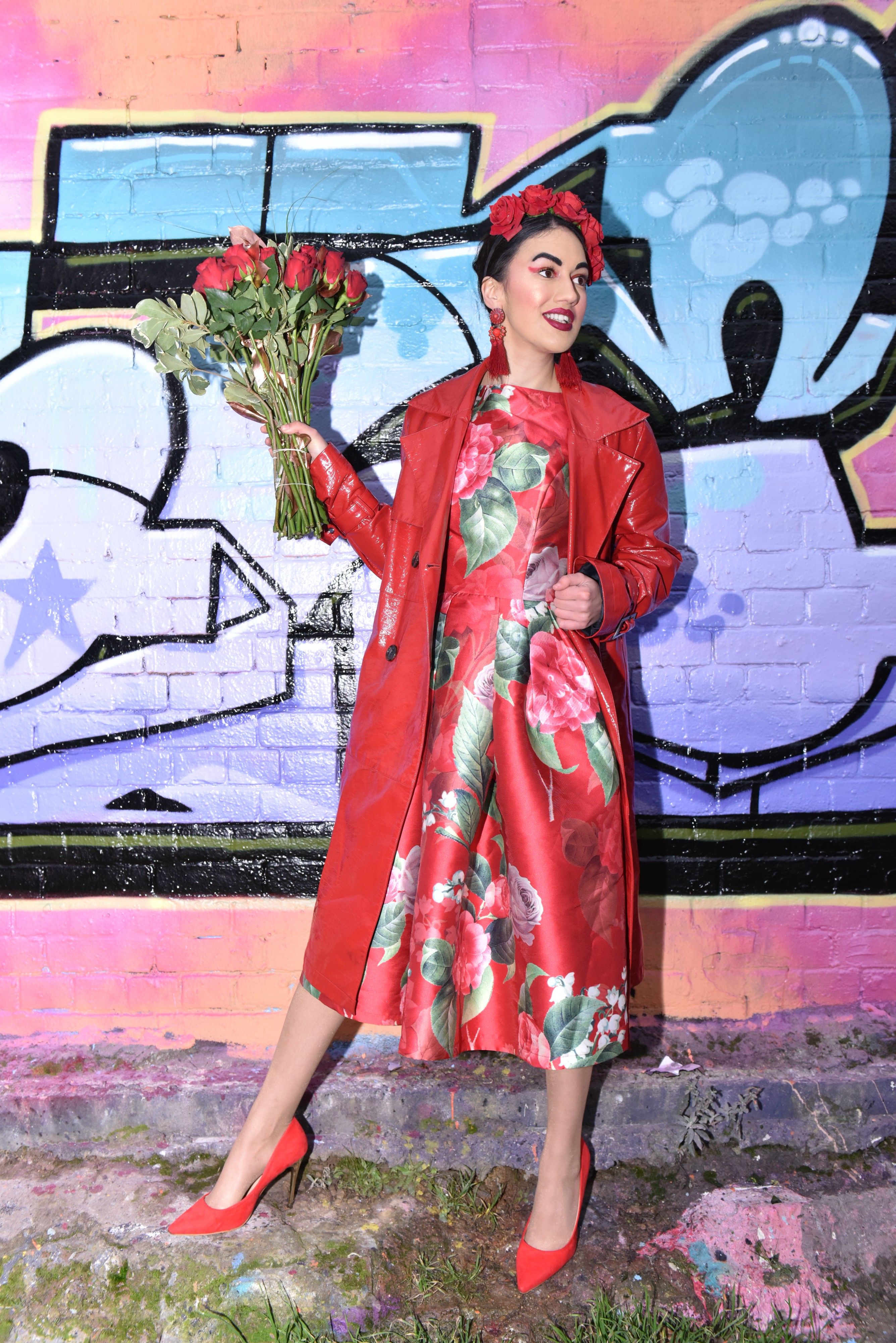 <img src="ana.jpg" alt="ana red floral dress and red coat"/> 