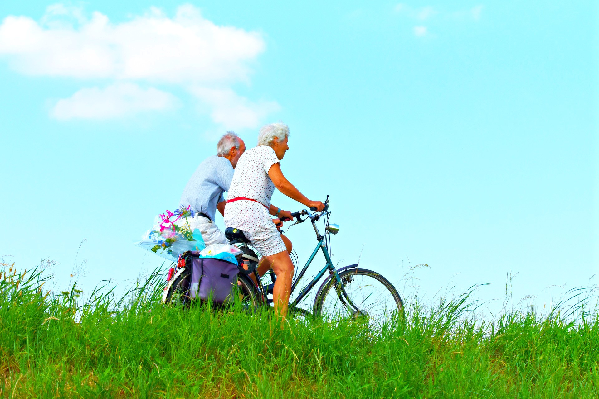  <img src="elderly.jpg" alt="elderly couple on bikes wiith a sunny sky"/> 