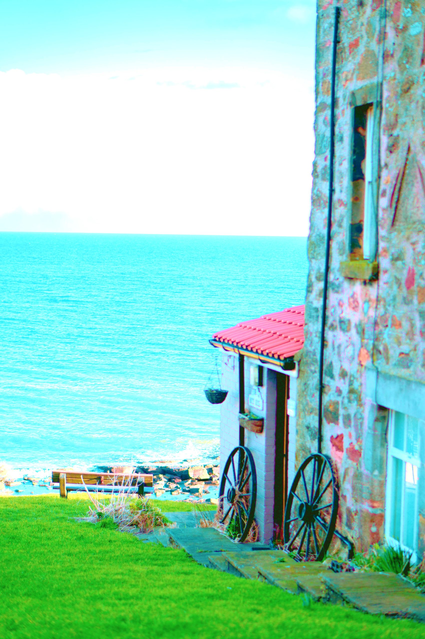 <img src="quaint.jpg" alt="quaint house by the sea"/> 