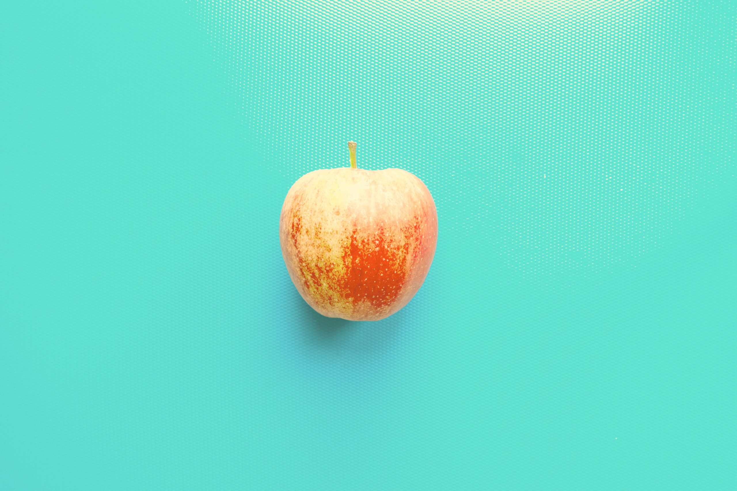 <img src="apple.jpg" alt=apple on blue background"/> 