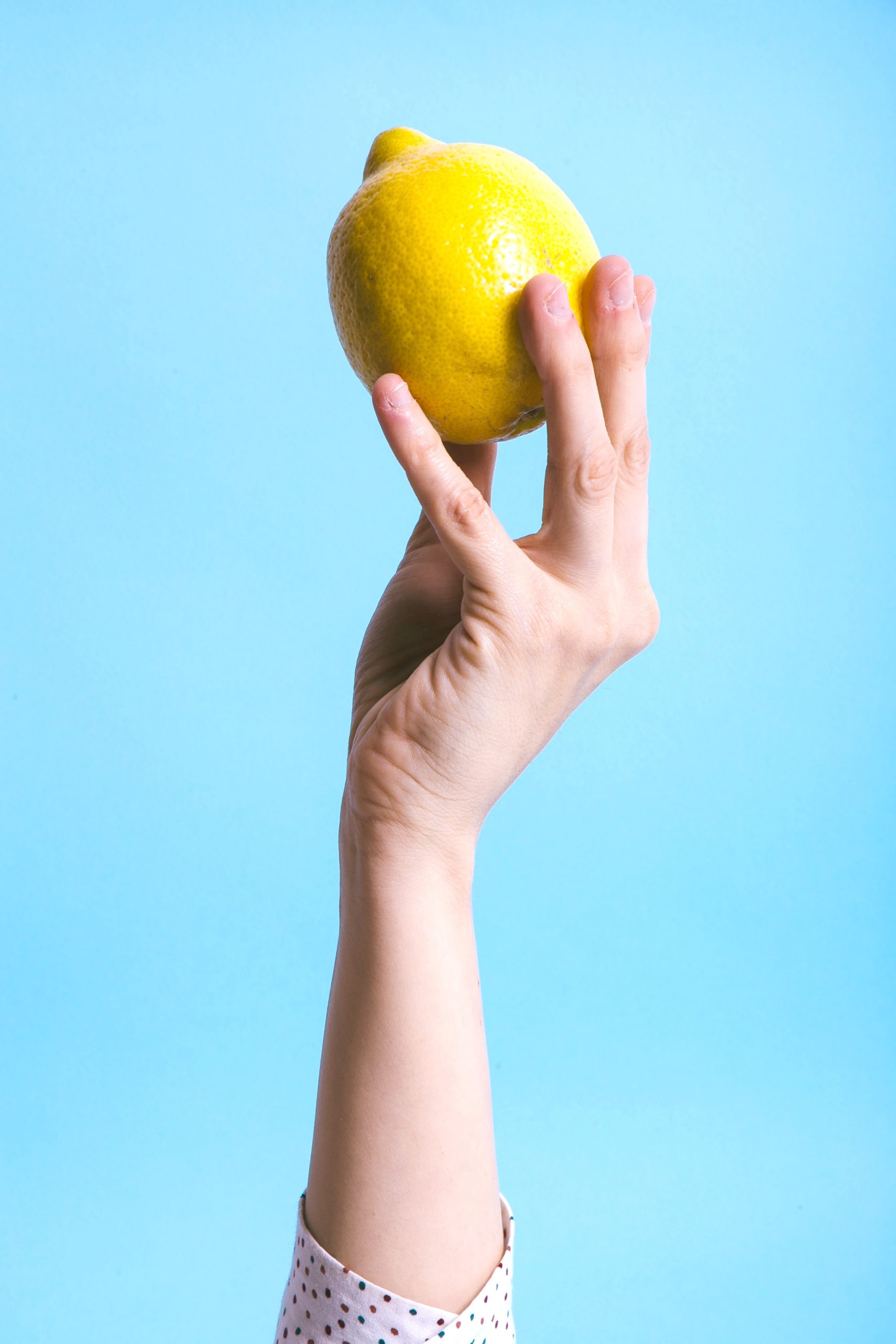 <img src="lemon.jpg" alt="arm holding up lemon"/> 