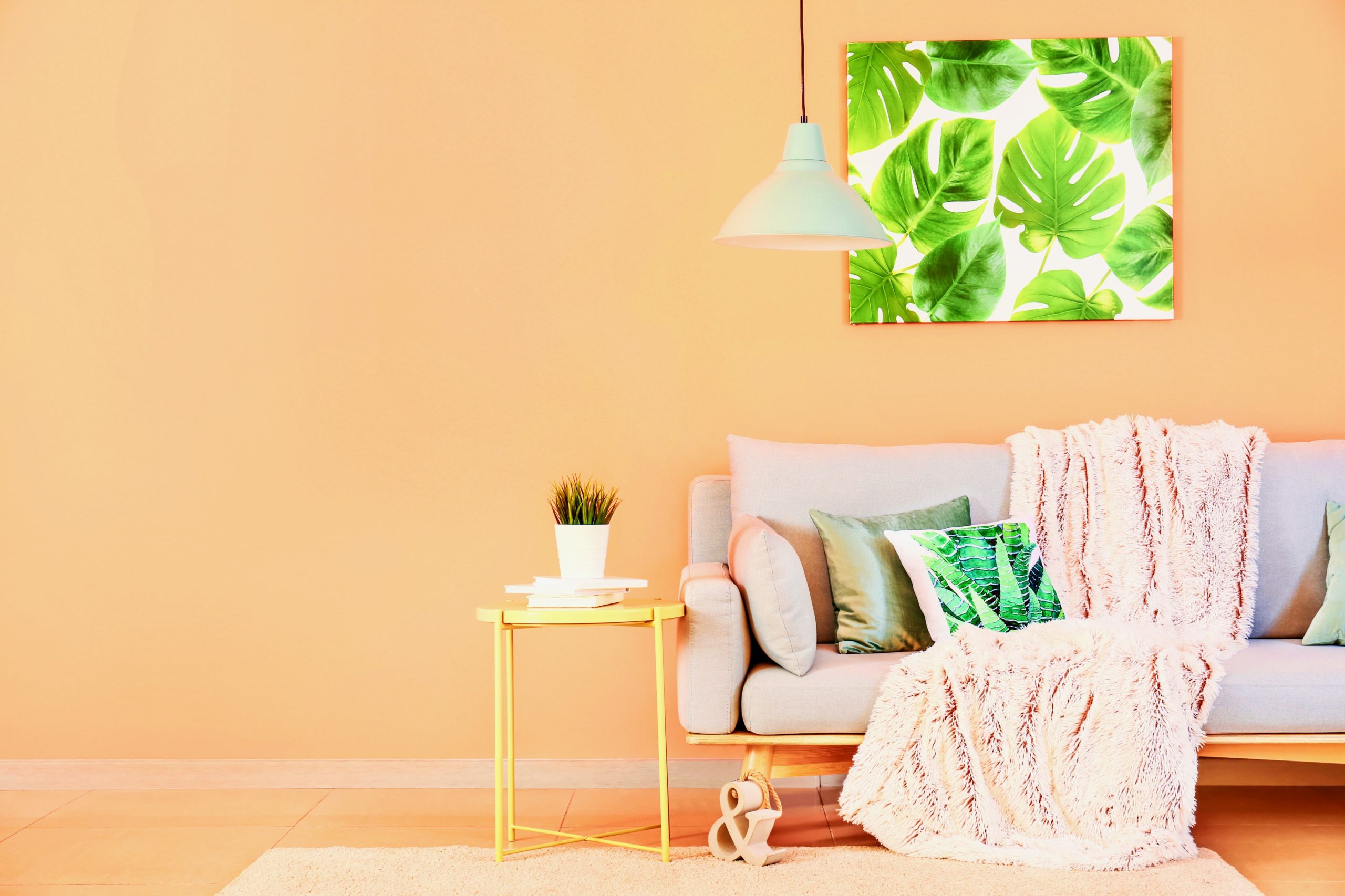 <img src="orange.jpg" alt="orange living room with wall art"/> 