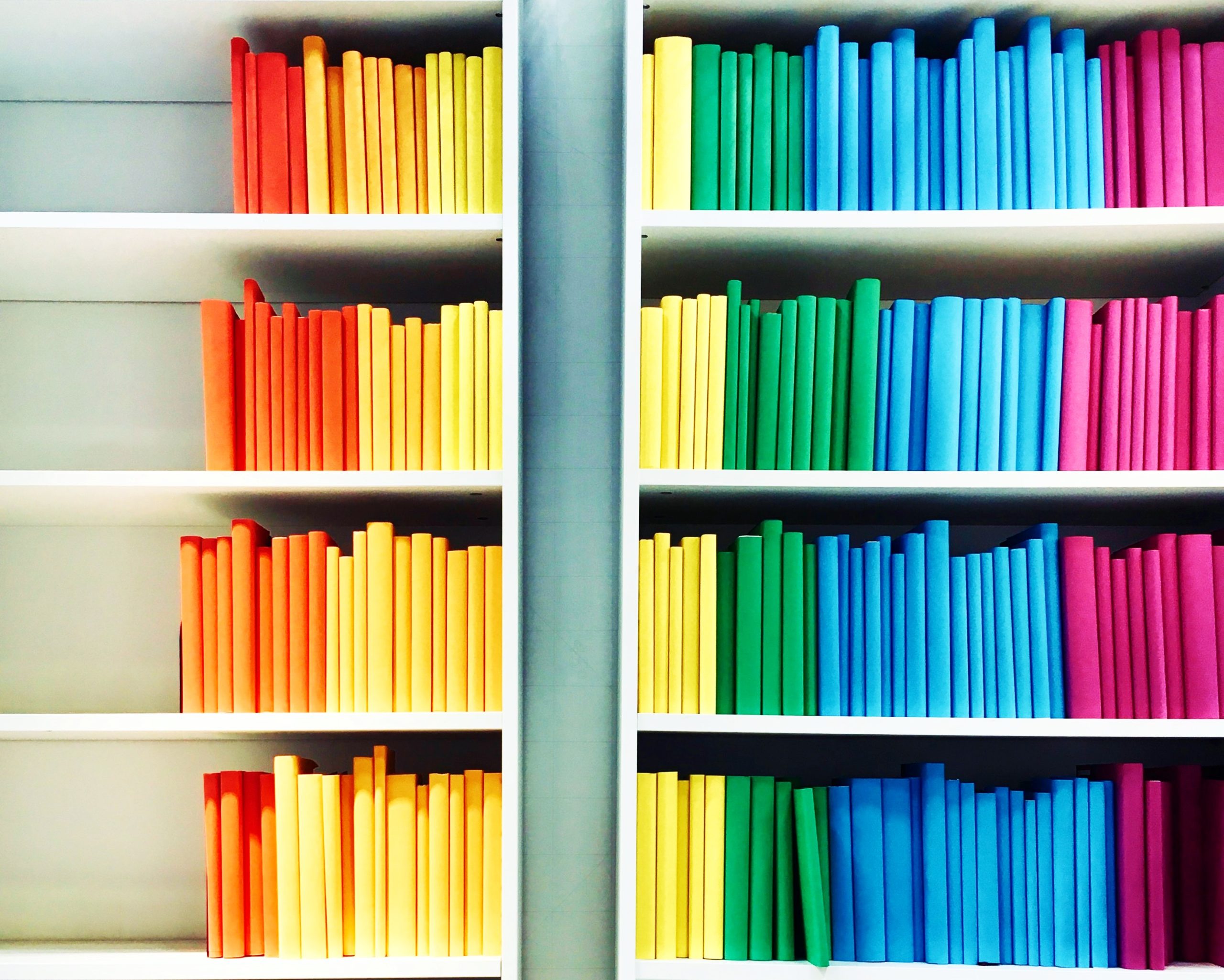 <img src="rainbow.jpg" alt="rainbow books on white shelf"/> 