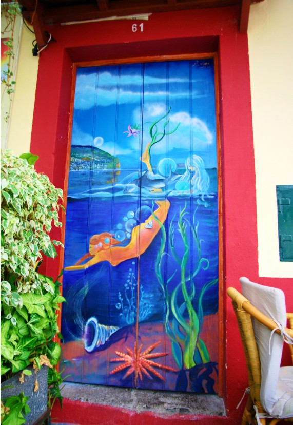 <img src="wolfgang.jpg" alt="wolfgang lass mermaid painted door"/> 