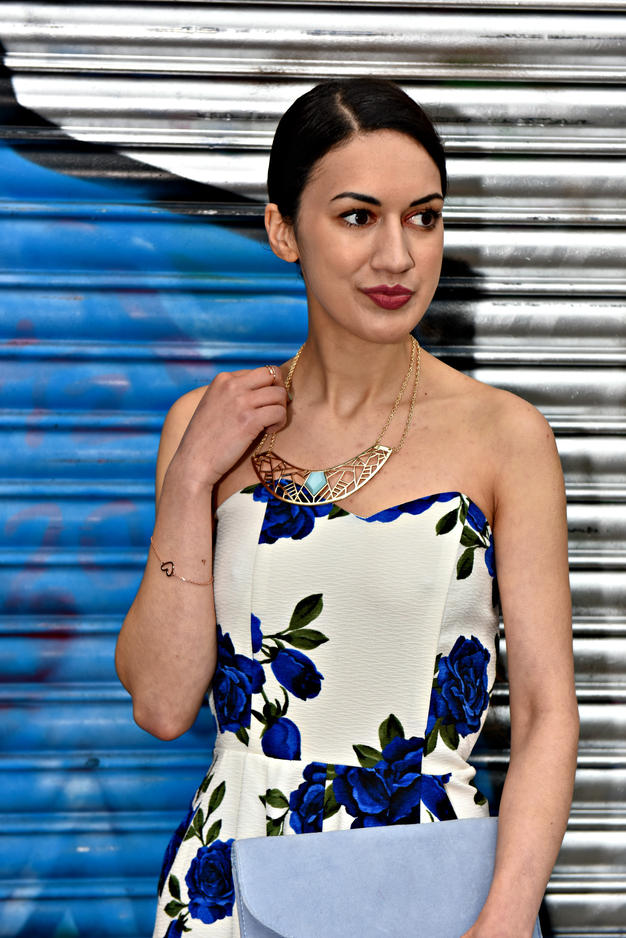 <img src="ana.jpg" alt="ana in floral jumpsuit and vintage fashion accessories"/> 