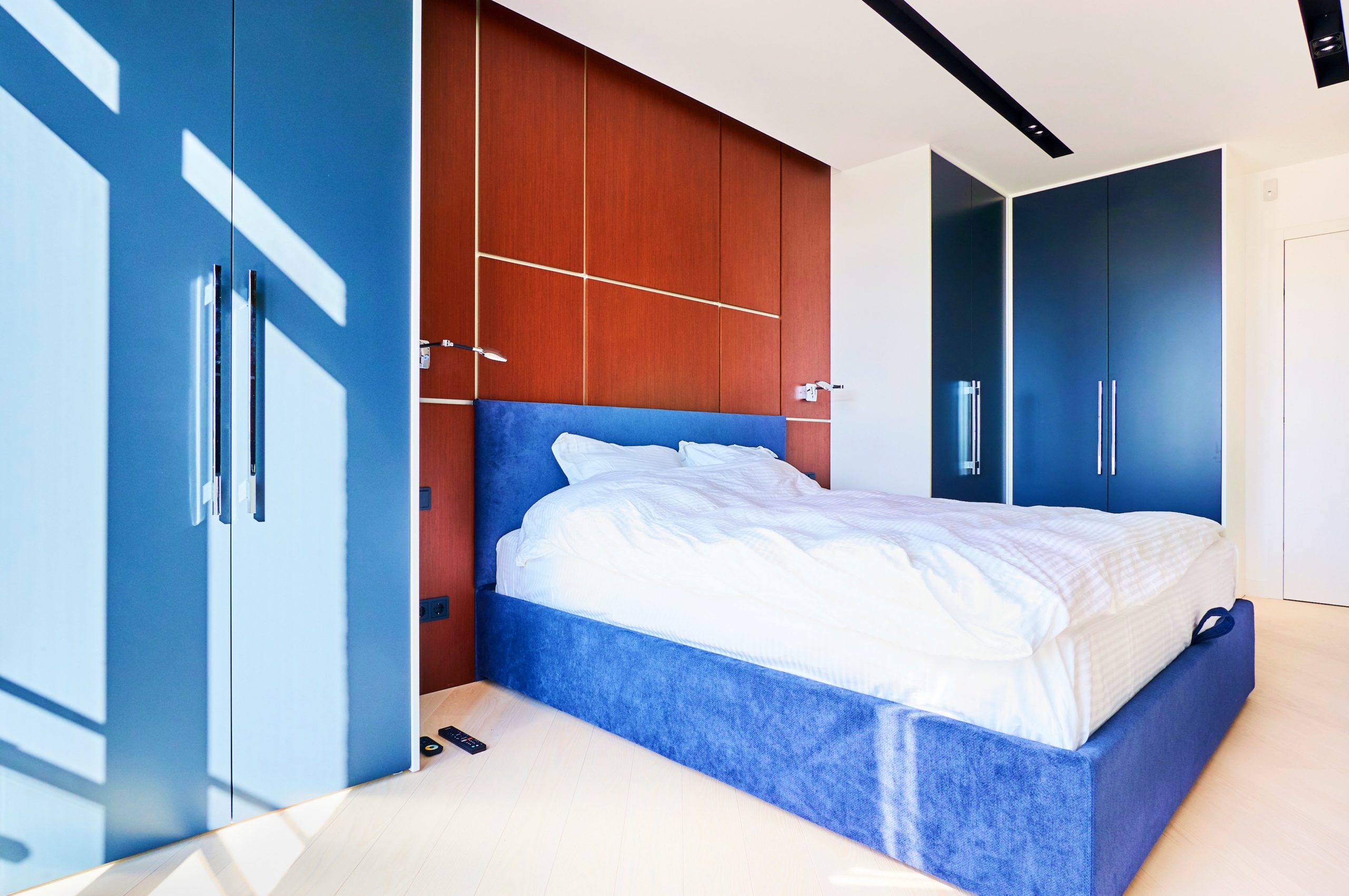 <img src="bedroom.jpg" alt="bedroom with blue fitted wardrobe"/> 