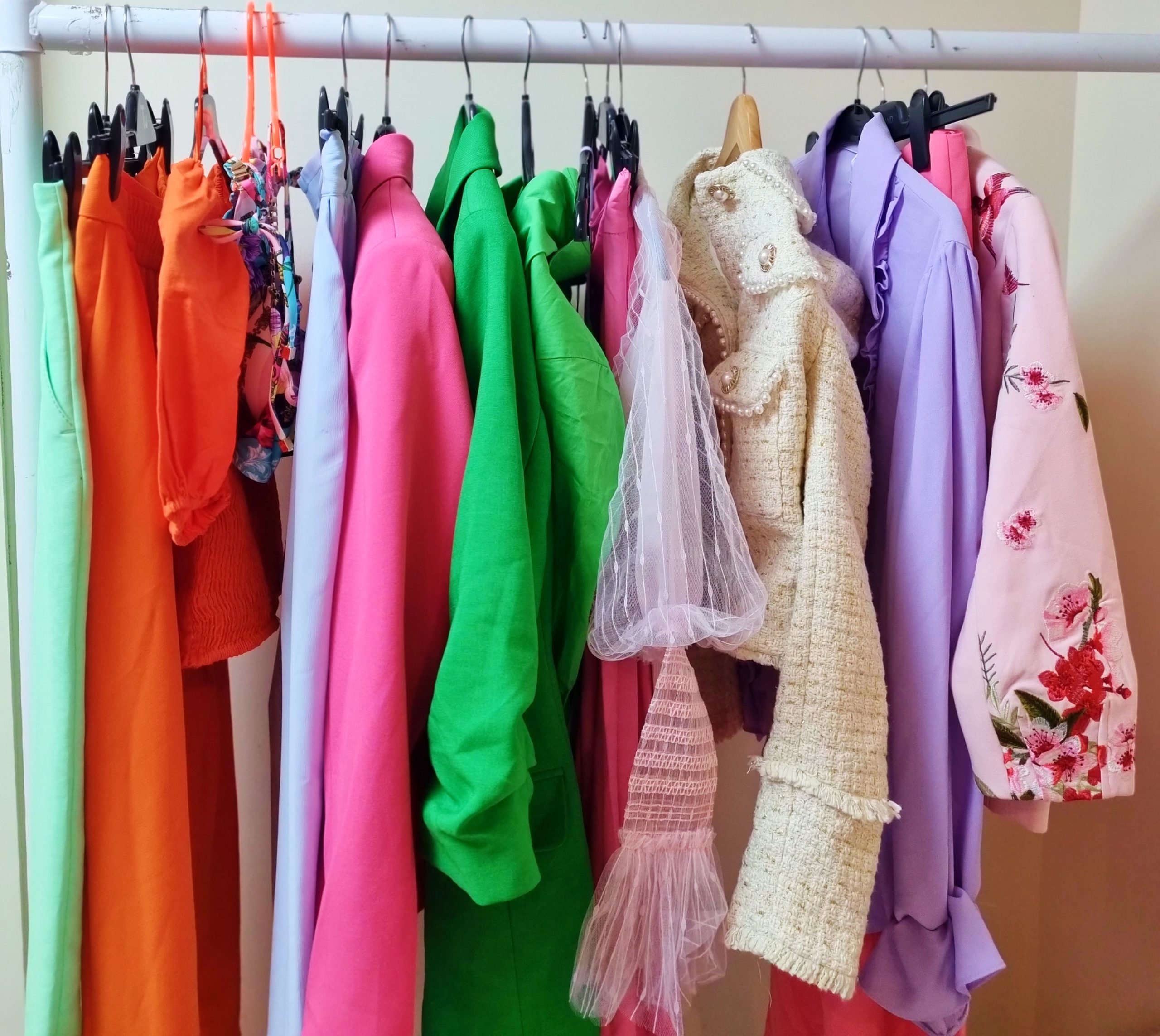 <img src="anajpg" alt="ana colourful rainbow clothes rail newlife"/> 