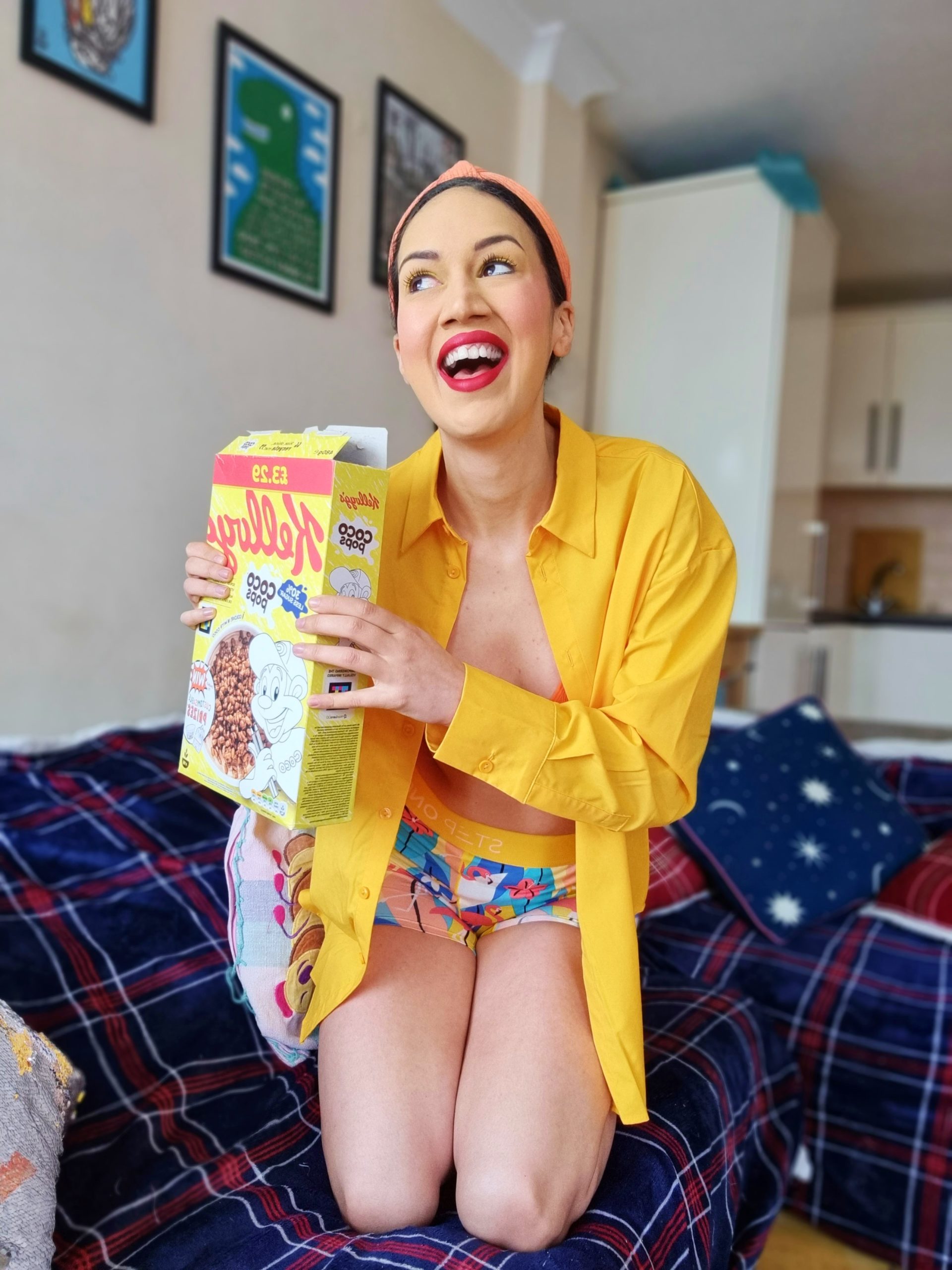 <img src="ana.jpg" alt="ana smiling in yellow button shirt and boxers "> 