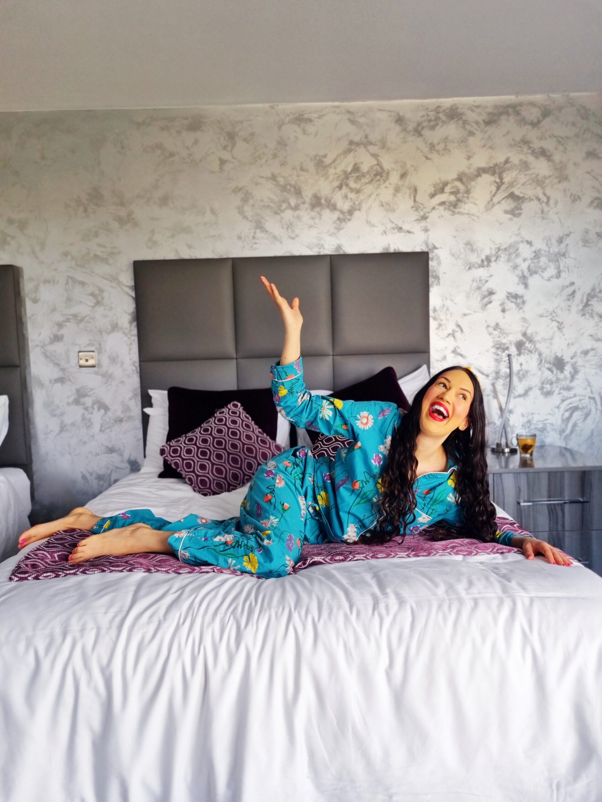 <img src="ana.jpg" alt="ana laughing on the bed in pjs"/>