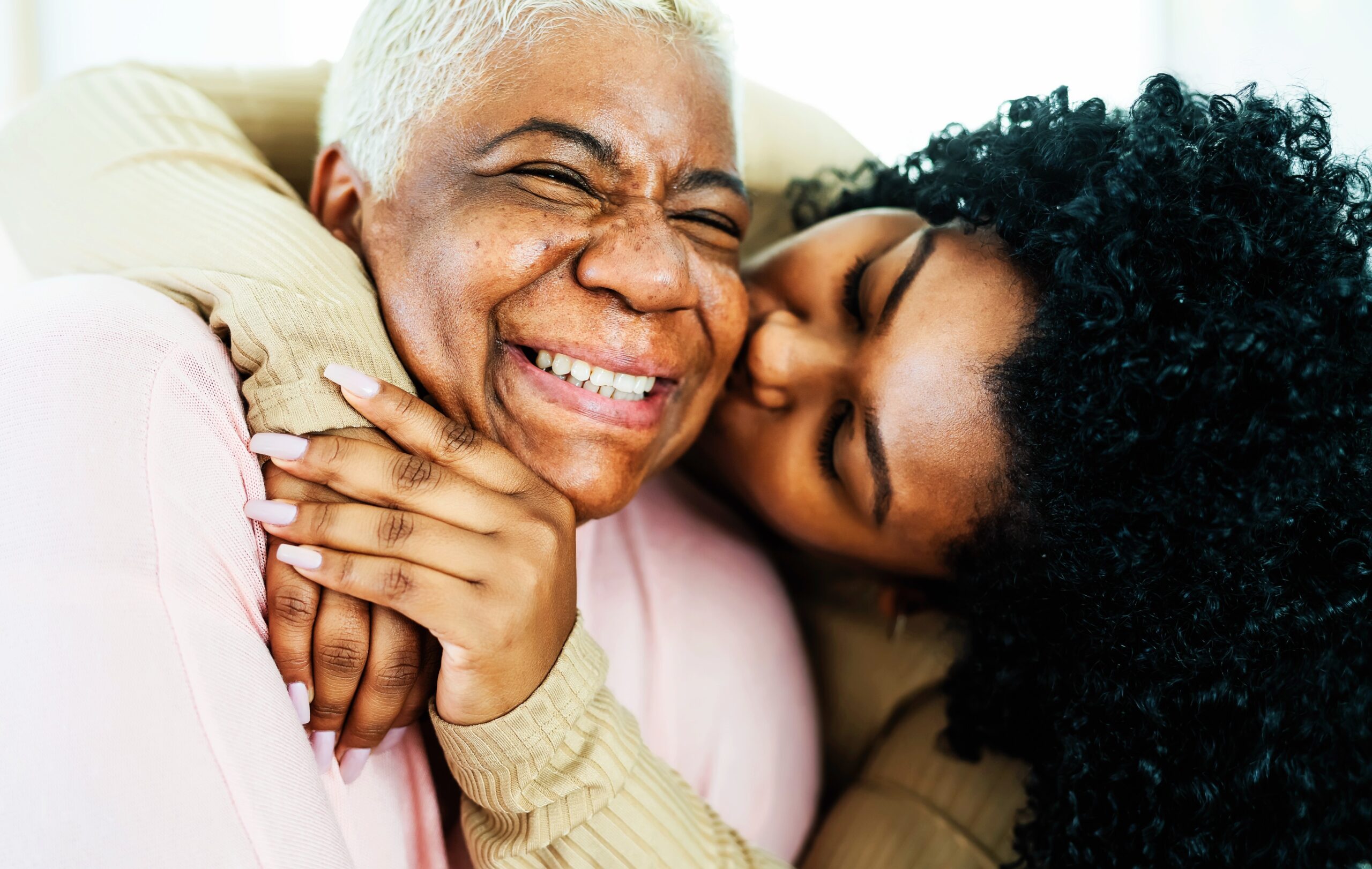 <img src="elderly.jpg" alt="elderly lady and her daughter smiling"/>